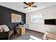 This home office boasts a desk, chair, and a serene workspace for enhanced productivity at 621 Avocado St, St Cloud, FL 34769