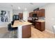 Well-equipped kitchen with island, stainless steel appliances, and granite countertops offers a modern cooking experience at 1228 Haines Dr, Winter Haven, FL 33881
