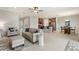 Spacious open-concept living room, kitchen, and dining area, perfect for entertaining at 1264 Bonita Canyon Dr, Kissimmee, FL 34759