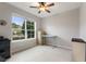 Bright office space featuring a large window and neutral decor at 1264 Bonita Canyon Dr, Kissimmee, FL 34759