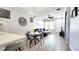 Open-concept living and dining area features stylish decor and plenty of natural light at 14620 Golden Rain Tree Blvd, Orlando, FL 32828