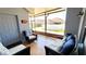 Relaxing screened patio offers comfortable seating and views of the backyard at 14620 Golden Rain Tree Blvd, Orlando, FL 32828