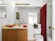 Bright bathroom featuring a shower-tub combo, wood vanity, and neutral decor at 151 Saragossa Ave, Davenport, FL 33897