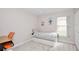 Bedroom with a trundle bed, a window, carpet, and white walls at 153 Laurel Ridge Pass, Davenport, FL 33897