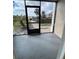 This enclosed outdoor lanai offers a relaxing space at 175N Pearl Lake Cswy # 114, Altamonte Springs, FL 32714