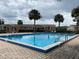 Community outdoor swimming pool with deck at 175N Pearl Lake Cswy # 114, Altamonte Springs, FL 32714