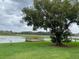 Scenic view of lake with a pier at 175N Pearl Lake Cswy # 114, Altamonte Springs, FL 32714