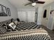 Bedroom featuring ceiling fan and closet at 2019 Dixie Belle Dr # 2019L, Orlando, FL 32812