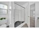 Clean bathroom with a glass-enclosed shower and modern fixtures, showcasing the updated design at 2450 Parsons Pond Cir, Kissimmee, FL 34743
