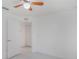 Clean bedroom offers a ceiling fan and a closet at 251 Tower View W Dr, Haines City, FL 33844
