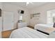 Well-lit bedroom with two beds, natural light, and a modern style at 313 Lucaya Loop # 313, Davenport, FL 33897