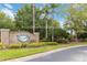 Community entrance sign with stone details, landscaping, and the Bahama Bay Resort logo at 313 Lucaya Loop # 313, Davenport, FL 33897