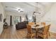 Bright living room with modern furnishings and a dining table offering a comfortable and stylish living space at 313 Lucaya Loop # 313, Davenport, FL 33897