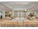 Well-lit lobby with comfortable seating arrangements and stylish decor at 313 Lucaya Loop # 313, Davenport, FL 33897
