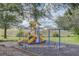 Community playground with swings, slide and other activities at 313 Lucaya Loop # 313, Davenport, FL 33897