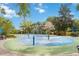 Community splash pad featuring vibrant play structures, tables and lush landscaping at 313 Lucaya Loop # 313, Davenport, FL 33897