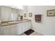 Spacious bathroom showcasing double sinks with vanity and stylish decor at 3390 Fallbrook Dr, Kissimmee, FL 34759