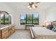 Bedroom featuring a serene view from its expansive window at 3390 Fallbrook Dr, Kissimmee, FL 34759
