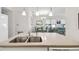 View of the kitchen island leading to the dining and living area at 3390 Fallbrook Dr, Kissimmee, FL 34759