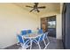 Screened lanai featuring a dining table and chairs, perfect for outdoor entertaining at 3390 Fallbrook Dr, Kissimmee, FL 34759