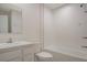Clean bathroom featuring a bathtub and shower, toilet, and modern sink and vanity at 345 Sedgewick Dr, Davenport, FL 33837