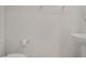 Half bathroom featuring a toilet and vanity with modern fixtures at 345 Sedgewick Dr, Davenport, FL 33837