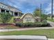 Welcoming community entrance sign that reads 'Magnolia Grove' in a neutral color palette and stone accents at 345 Sedgewick Dr, Davenport, FL 33837