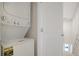 Conveniently located laundry room with a stacked washer and dryer unit at 345 Sedgewick Dr, Davenport, FL 33837