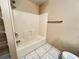 Clean bathroom featuring a shower over tub and a large mirror at 401 Talquin Ct, Orlando, FL 32807