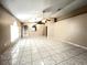Spacious open floor plan with tile flooring, perfect for entertaining guests and gatherings at 401 Talquin Ct, Orlando, FL 32807