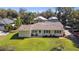 Charming single-story home with a well-maintained lawn and inviting curb appeal at 401 Woodlawn Ter, Kissimmee, FL 34744