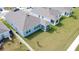 Aerial view of the back of the home showcasing the covered patio and spacious fenced backyard at 4211 Little Owl Ln, Kissimmee, FL 34746