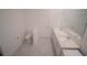This bathroom features double sinks, a toilet, and tiled floors at 4211 Little Owl Ln, Kissimmee, FL 34746