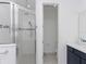 Modern bathroom showcasing a glass-enclosed shower, stylish tile work, and contemporary fixtures at 4507 Lions Gate Ave, Clermont, FL 34711