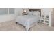 This bedroom offers ample space, natural light, and a cozy, inviting ambiance at 4507 Lions Gate Ave, Clermont, FL 34711