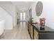 Bright entryway features high ceilings, light floors, and double doors leading outside at 4507 Lions Gate Ave, Clermont, FL 34711
