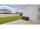 Covered back patio and yard offers outdoor living and entertaining space at 4507 Lions Gate Ave, Clermont, FL 34711
