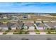 A high angle shot showcases houses with neat landscaping in a well-planned neighborhood at 485 Disa Dr, Davenport, FL 33837