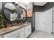 Bathroom features double sinks, granite counters, and modern fixtures at 485 Disa Dr, Davenport, FL 33837