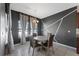 Eat-in dining area with stylish chandelier and light-filled windows at 485 Disa Dr, Davenport, FL 33837
