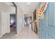 A bright entryway with tiled floors, decorative accents, and views into the living spaces at 485 Disa Dr, Davenport, FL 33837