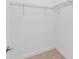 Walk-in closet with carpet flooring, white walls and door, and wire shelving at 4918 Drawdy Ct, St Cloud, FL 34772