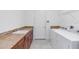 The laundry room has granite countertops and a washer and dryer at 4918 Drawdy Ct, St Cloud, FL 34772