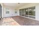 Covered, screened-in brick patio provides an outdoor living space, connecting seamlessly to the interior at 4918 Drawdy Ct, St Cloud, FL 34772