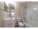 Bright bathroom with a single vanity, mirror, and a shower-tub combo at 635 Lake Marion Golf Resort, Kissimmee, FL 34759