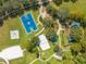 Aerial view of community basketball court, park, volleyball court, and picnic areas at 7128 Red Lantern Dr # 0, Harmony, FL 34773