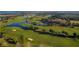 Picturesque golf course with manicured greens and water hazards at 7128 Red Lantern Dr # 0, Harmony, FL 34773