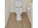 Close-up of toilet and tile floor in bathroom at 7128 Red Lantern Dr # 0, Harmony, FL 34773