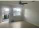 Versatile living space with neutral tile flooring and ample light, perfect for customization at 736 Nw 31St Ct, Winter Haven, FL 33881