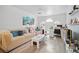 Inviting living room featuring plush seating and ample lighting at 7623 Excitement Dr, Reunion, FL 34747